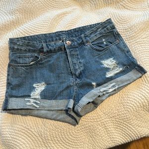 Divided distressed shorts.size 8